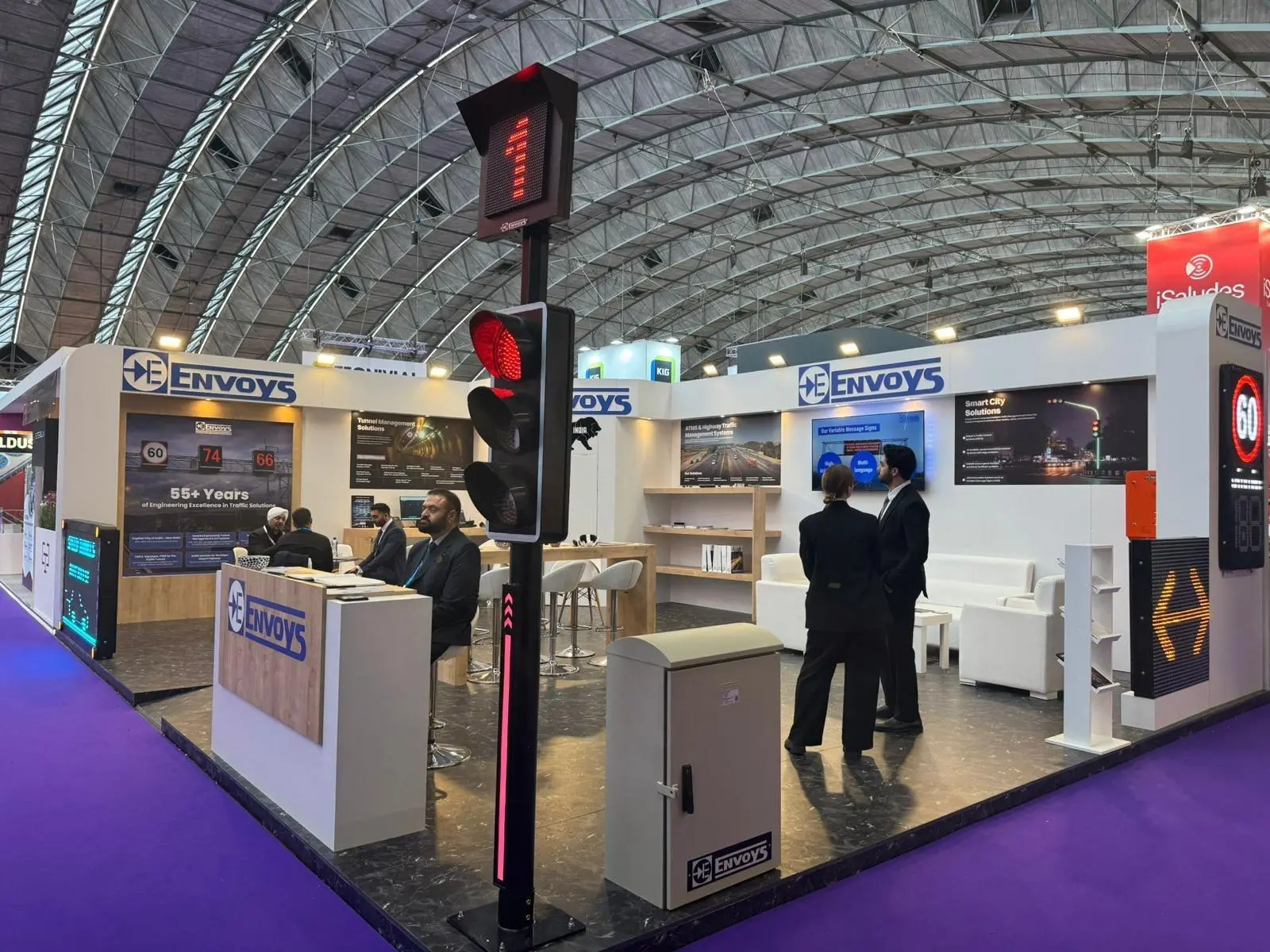 A stylish exhibition booth showcasing modern Scandinavian furniture and decor elements.