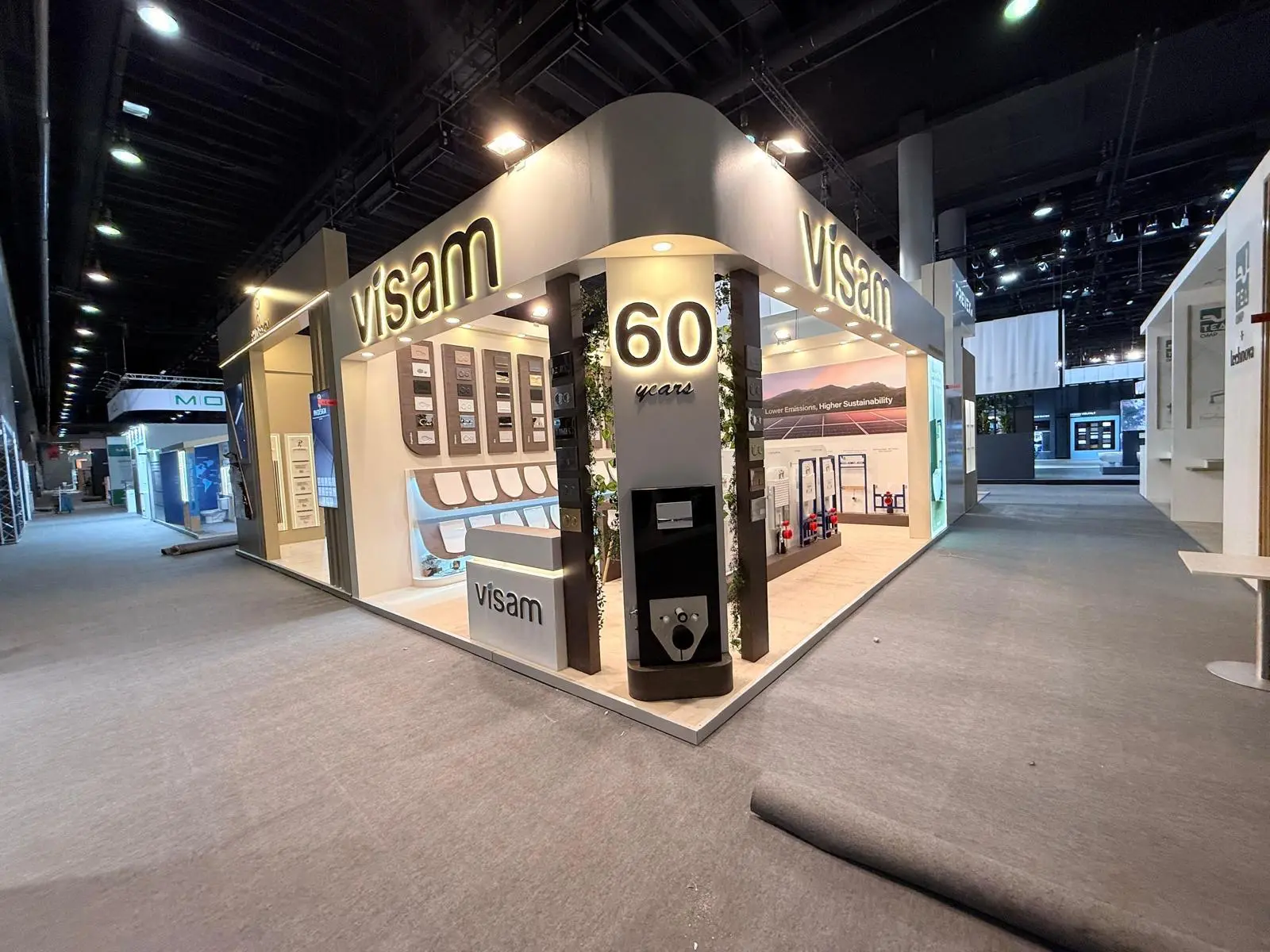 A stylish exhibition booth showcasing modern Scandinavian furniture and decor elements.