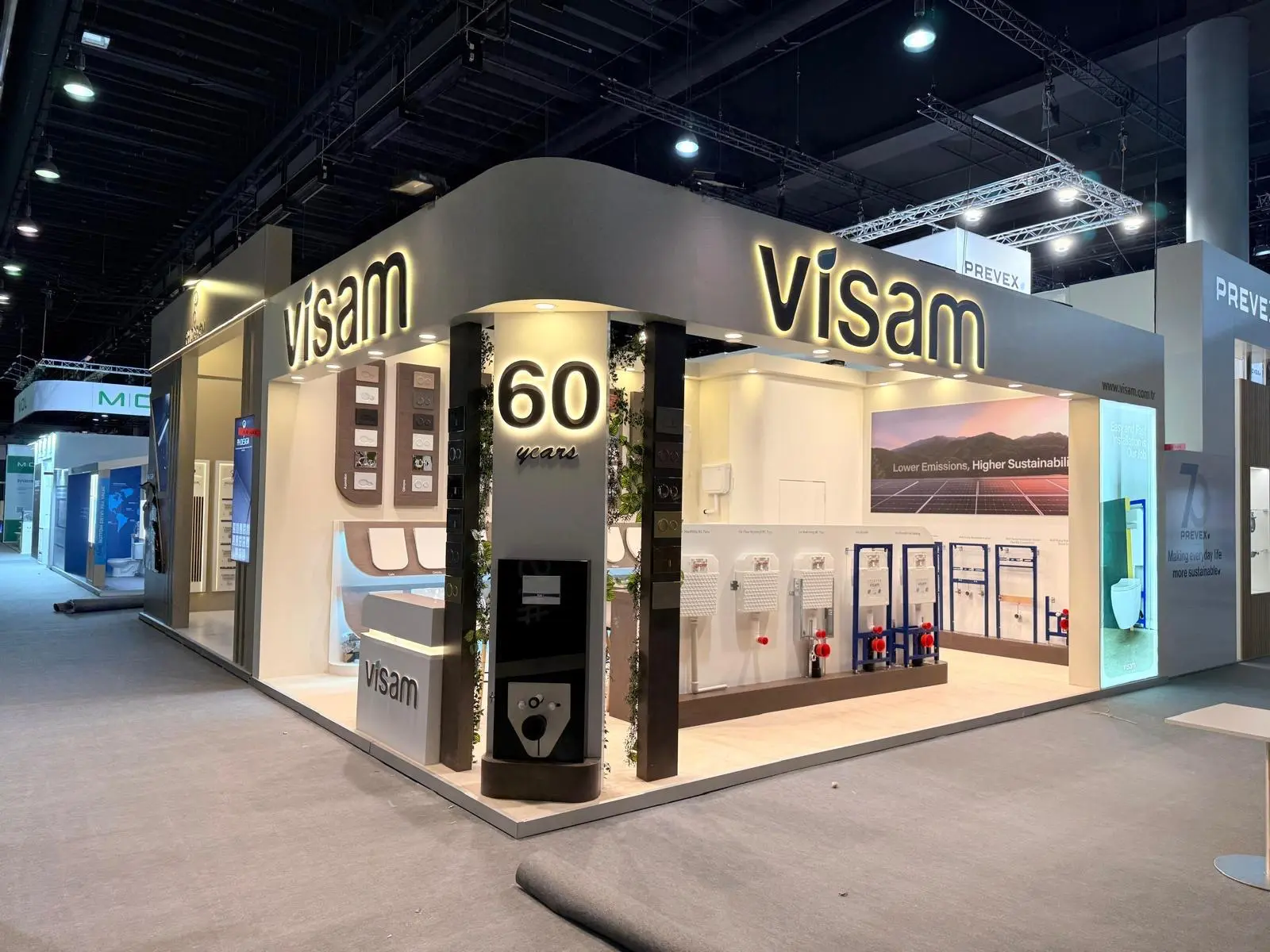 A stylish exhibition booth showcasing modern Scandinavian furniture and decor elements.